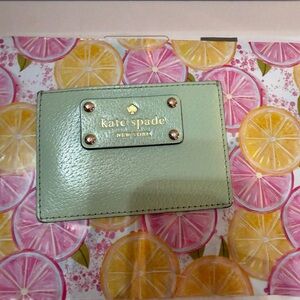 Kate Spade Mint Green Card Holder with Gold Logo